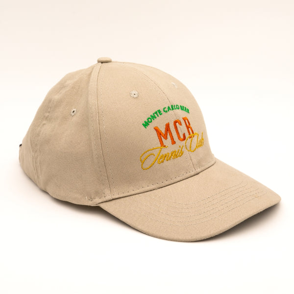 Casquette beige MCB édition Tennis Club, sur le côté et sur fond blanc