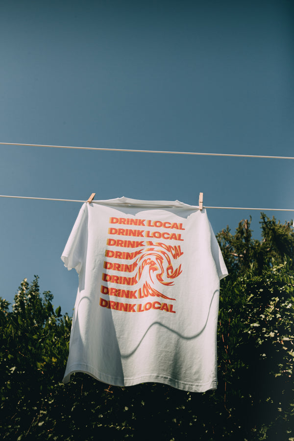 T-shirt Monte Carlo Beer blanc en coton bio avec écrit au dos "Drink Local"